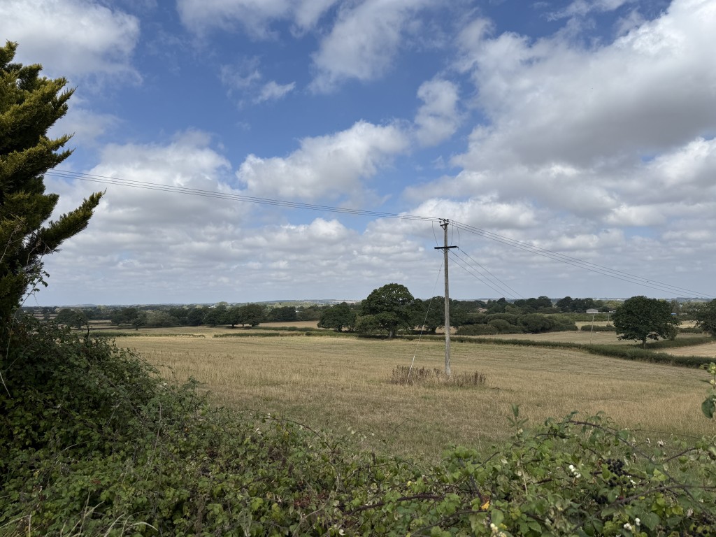 Lot: 170 - FORMER METHODIST CHAPEL WITH PLANNING FOR CONVERSION TO A RESIDENTIAL DWELLING ON PLOT OF 0.39 ACRES - View across fields from garden